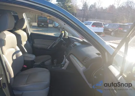 2015 Subaru Forester 2.5I Touring z USA, uszkodzony, nr VIN JF2SJAUC7FH588703